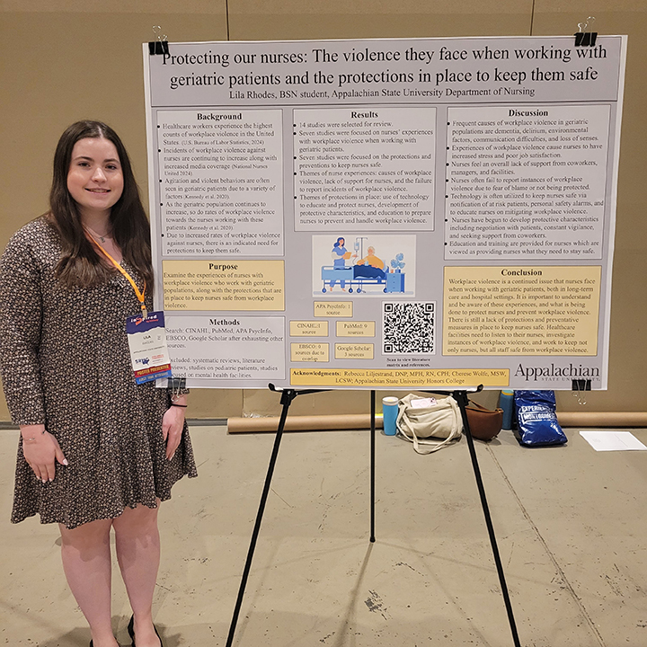 Photo of Lila Rhodes at SRHC with poster presentation