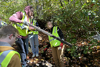 Honors students Gavin Weidner, Grace Carter, Grace Guevarra, and Ella Watt with AHA! doing trail maintenance on the Price Lake Loop Trail on October 21, 2023