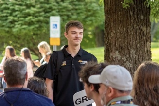 Jackson White stands near tree during summer orientation 2026.