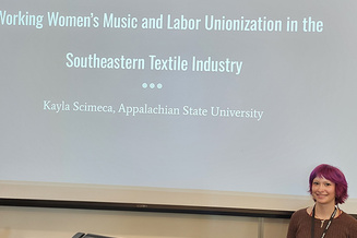 Kayla Scimeca presents at the NCHA conference at UNC Pembroke. 